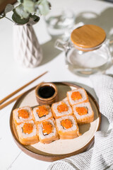 Sushi roll Philadelphia with salmon and caviar