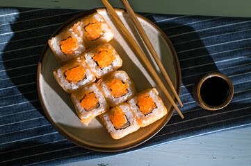 Sushi roll Philadelphia with salmon and caviar