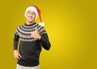 Christmas - Young man gesturing