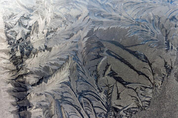 .the frosty patterns on the window
