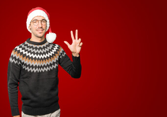 Fototapeta premium Christmas - Young man gesturing
