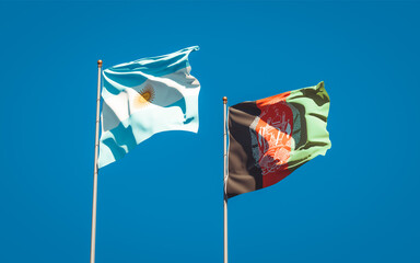 Beautiful national state flags of Afghanistan and Argentina together at the sky background. 3D artwork concept.