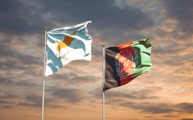 Beautiful national state flags of Afghanistan and Cyprus together at the sky background. 3D artwork concept.