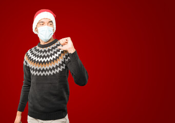 Fototapeta na wymiar Christmas - Young man gesturing