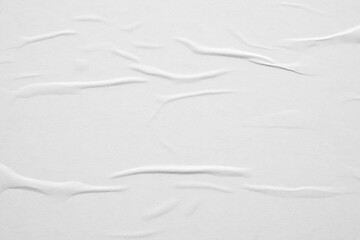 Blank white crumpled and creased paper poster texture background