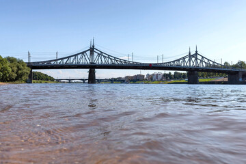 Fototapeta premium Tver. Tver region. Walk along the Volga. View of the New Volga bridge and the old Volga bridge.