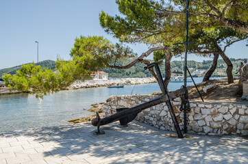 Old anchor exhibited at the port of Skiathos 