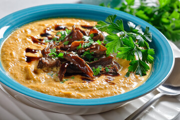 Pumpkin soup with mushrooms and coconut milk