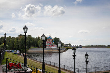 Uglich. The Volga River Embankment. A slender row of beautiful lanterns. Rhythm. Prospect