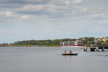 Fototapeta na wymiar Uglich. Cruise ship on the Volga. Before a storm