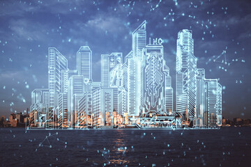 Double exposure of buildings hologram over cityscape background. Concept of smart city.