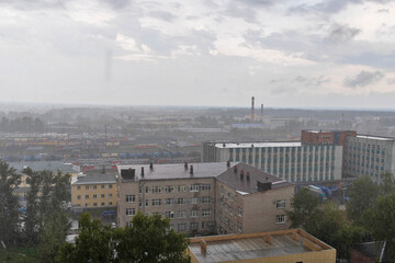 Obraz premium Yaroslavl. Yaroslavl. Foggy rainy morning. Top view of residential buildings and the railway