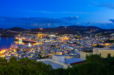 Fototapeta na wymiar Evening view of the city of Ermoupoli, the capital town of Syros island, in Cyclades, Aegean sea, Greece.