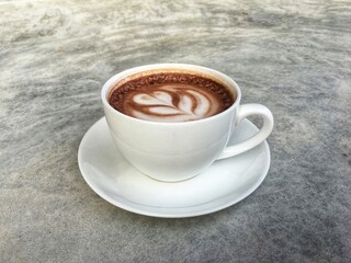Hot cocoa in white cup. Hot chocolate in white cup.
