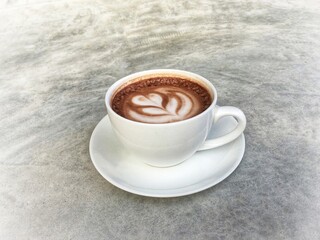 Hot cocoa in white cup. Hot chocolate in white cup.