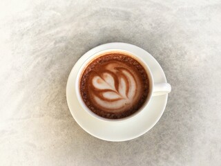 Hot cocoa in white cup. Hot chocolate in white cup.