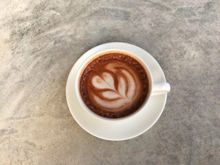 Hot cocoa in white cup. Hot chocolate in white cup.