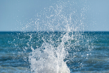 Wave of the sea water at sunny day time.