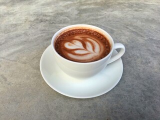 Hot cocoa in white cup. Hot chocolate in white cup.