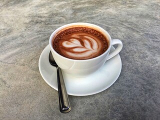 Hot cocoa in white cup. Hot chocolate in white cup.