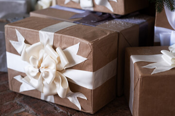 Christmas gifts Packed in boxes with bows and sprinkled with snow