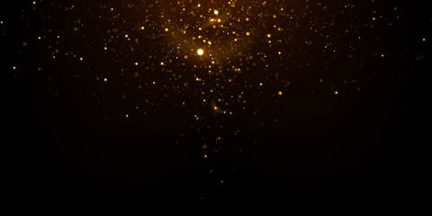 Abstract luxury background. Glowing golden particles on black. Sparkling glitter lights texture. 	