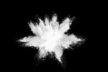 White powder explosion on dark background.