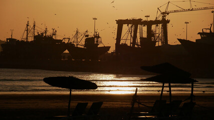Popular beach Plage Tagharte in Essaouira, Morocco at the coast of the Atlantic Ocean in the bright...