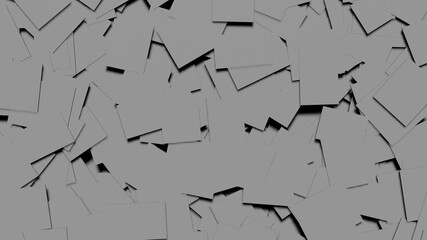 積み重なった様々な大きさの白い長方形の紙