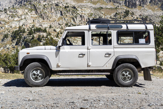 ESPOT, SPAIN-SEPTEMBER 5, 2020: Land Rover Defender 110 Station wagon standing on a mountain road (Side view)