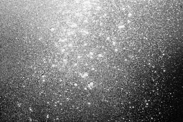 Flour on a colored background. A pile of flour on a white background. Spilled flour. Flour texture