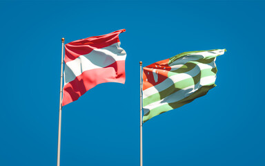 Obraz premium Beautiful national state flags of Abkhazia and Austria.