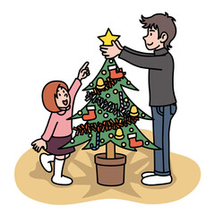 クリスマスツリーの飾り付けをするパパと娘