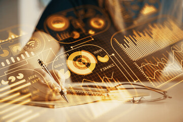 Technology theme hologram over woman's hands taking notes background. Concept of Tech. Double exposure