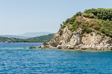 Evia island, Greece - June 28. 2020: Panorama of access to the beach on the island of Lihada - Greece 