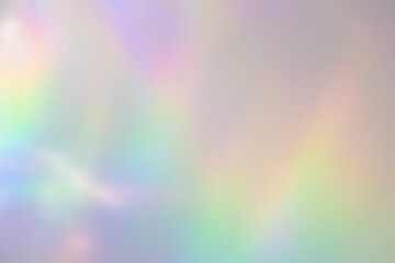 Blurred rainbow light refraction texture overlay effect for photo and mockups. Organic drop...