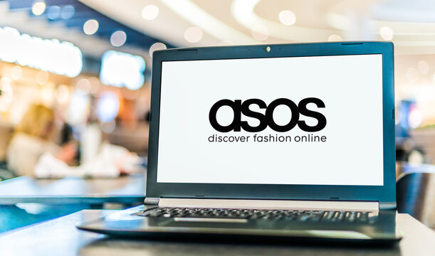 Laptop computer displaying logo of ASOS