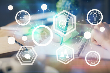 Social network theme hologram over woman's hands writing background. Concept of international people connect. Double exposure