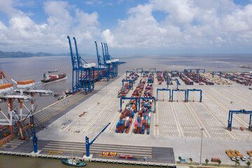 Aerial view, top view cargo ship port in the export, import by ship business and logistics...