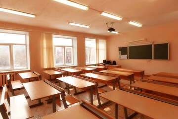 Interior of an empty school classroom. Concept of coronavirus COVID-19 quarantine in schools and educational institutions