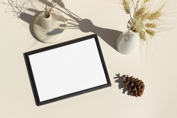 Empty black picture frame white background copy space with natural props