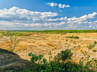 Naklejka premium A quarry and excavators equipment in landscapes.