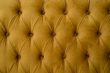 Cropped shot of mustard sofa