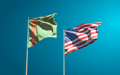 Beautiful national state flags of Turkmenistan and USA together at the sky background. 3D artwork concept.