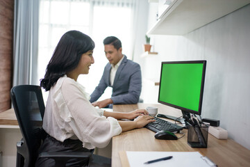 Portrait of coworkers who are busy working according to their respective places. in the office