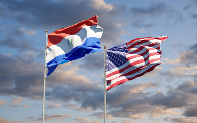 Beautiful national state flags of Paraguay and USA together at the sky background. 3D artwork concept.