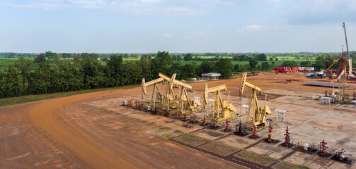 Aerial view of field oil pump jack oil rig machine for pumping natural fossil fuel, webinar banner