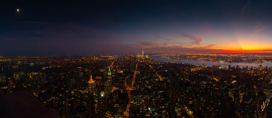 Fototapeta premium New York Manhattan skyline top view during autumn sunset with amazing colors and sights of skyscrapers