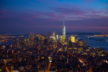 Fototapeta premium New York Manhattan skyline top view during autumn sunset with amazing colors and sights of skyscrapers