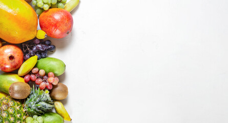 Mixed fruits and berries background. Healthy eating, dieting.